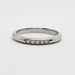 Straight view of 14kt white gold ring with five Canadian diamonds