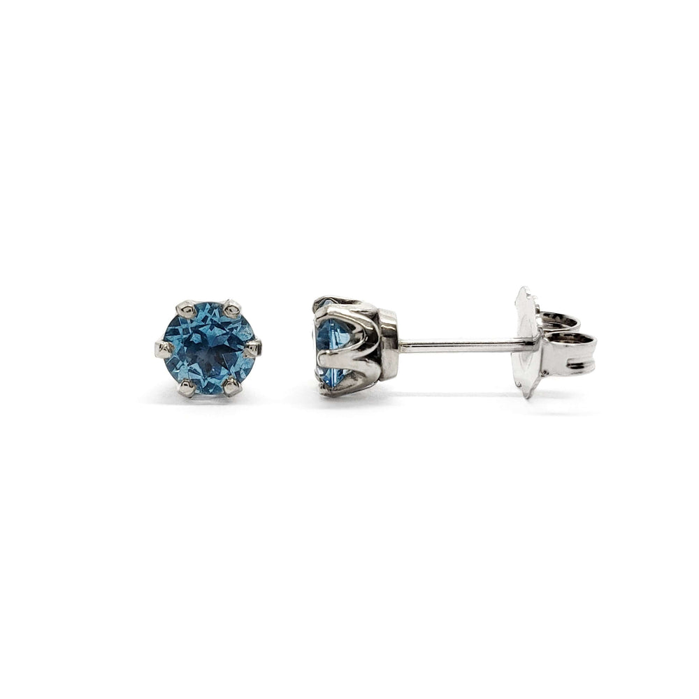 Swiss blue topaz six-prong stud earrings in 14kt white gold