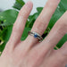 Three-ring stack with chevron diamond wedding ring and blue sapphire ring