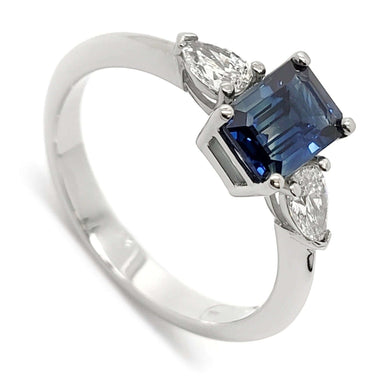 Three-stone 14kt white gold ring with emerald cut blue Australian sapphire and pear diamonds