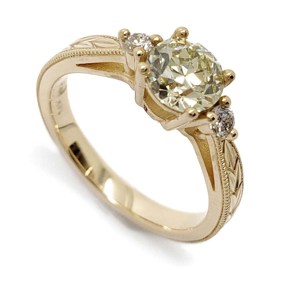 Three-stone 14kt yellow gold engagement ring with old European diamond and hand engraving