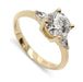Three-stone engagement ring in 14kt yellow gold with round lab diamond and pear-shaped side diamonds