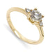 Three-stone engagement ring in 14kt yellow gold with round vintage diamond and two side diamonds