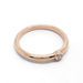 Minimalist 14kt rose gold bezel set diamond ring viewed from above