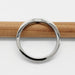 Top view of 14kt white gold chevron wedding band on pencil, showing smooth band