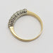 Top view of vintage seven-stone diamond ring in 18kt yellow and white gold