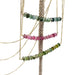 Tourmaline bead bar necklaces in teal, pink, and green on a display stand