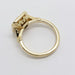 Underside of 14kt yellow gold engagement ring showing detailed gallery work