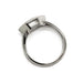 Underside of 14kt white gold ring showing bezel setting of hexagon lab diamond