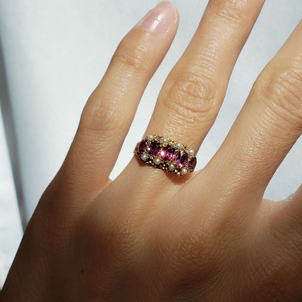 Victorian pearl and fluorite 15kt yellow gold ring worn on a hand