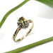 Vintage 10kt yellow gold sapphire and diamond halo ring styled with green leaves