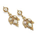 Pair of vintage 14kt yellow gold dangle earrings with pear cabochon opals and twig-like texture