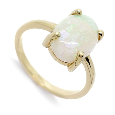 Vintage 14kt yellow gold ring with oval cabochon white opal in prong setting