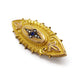 Detailed view of vintage 9k gold mourning pin with seed pearls and blue stone