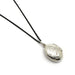 Vintage oval sterling silver engraved locket on a black chain, closed front view