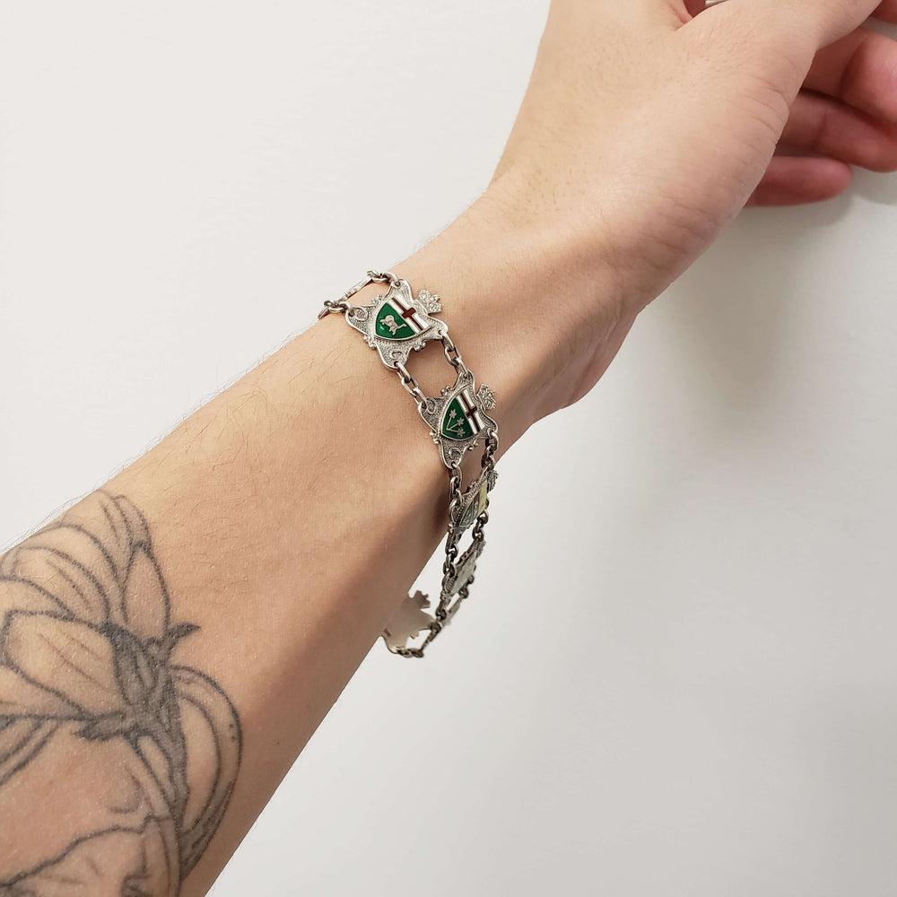 Vintage Canadian crest silver bracelet worn on wrist
