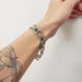 Vintage Canadian crest silver bracelet worn on wrist