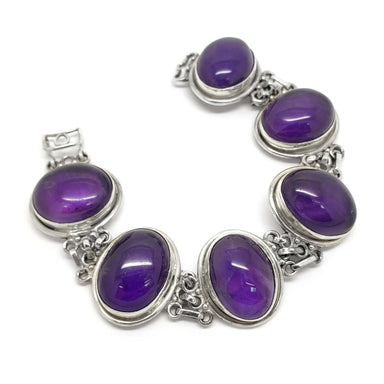 Vintage sterling silver bracelet with six large oval cabochon amethysts