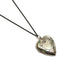 Vintage sterling silver heart locket with floral enamel detail on a black chain