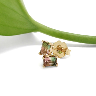 Watermelon tourmaline baguette studs in 14kt yellow gold with a green leaf accent