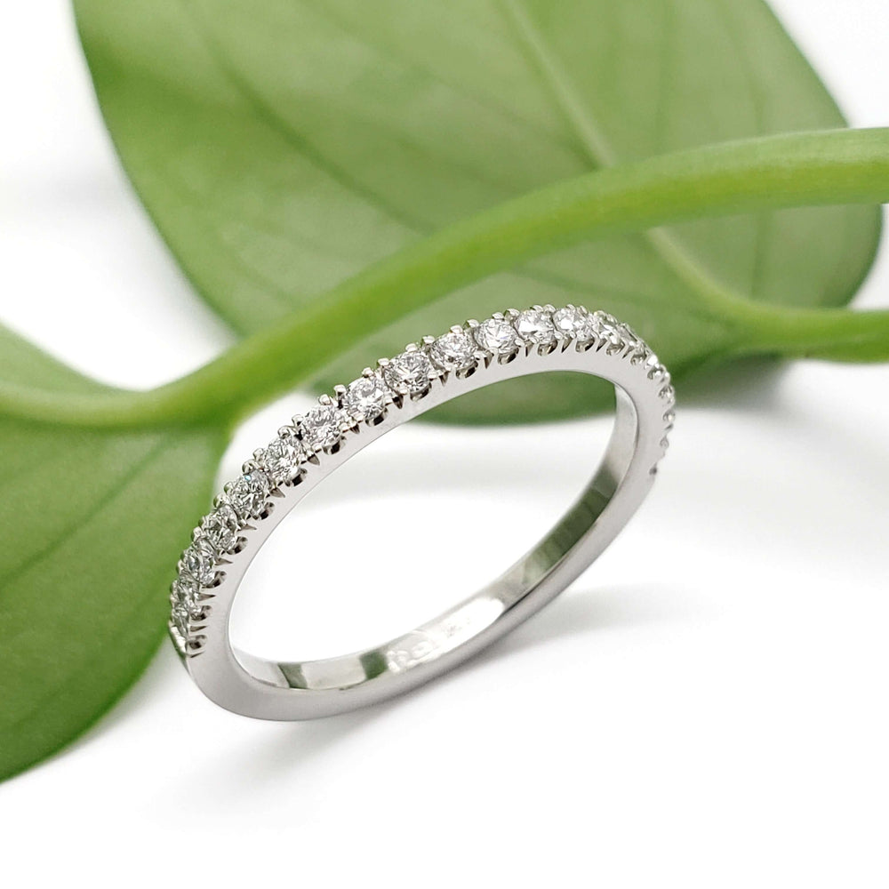 White gold lab diamond pave wedding ring with leaf background