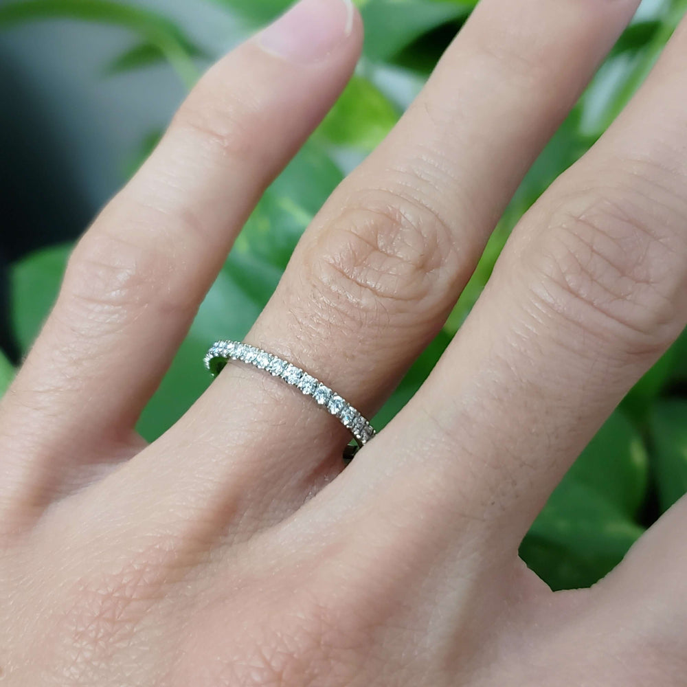 White gold lab diamond wedding ring worn on hand