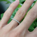 White gold lab diamond wedding ring worn on hand