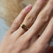14kt yellow gold Australian sapphire ring worn on hand in natural light