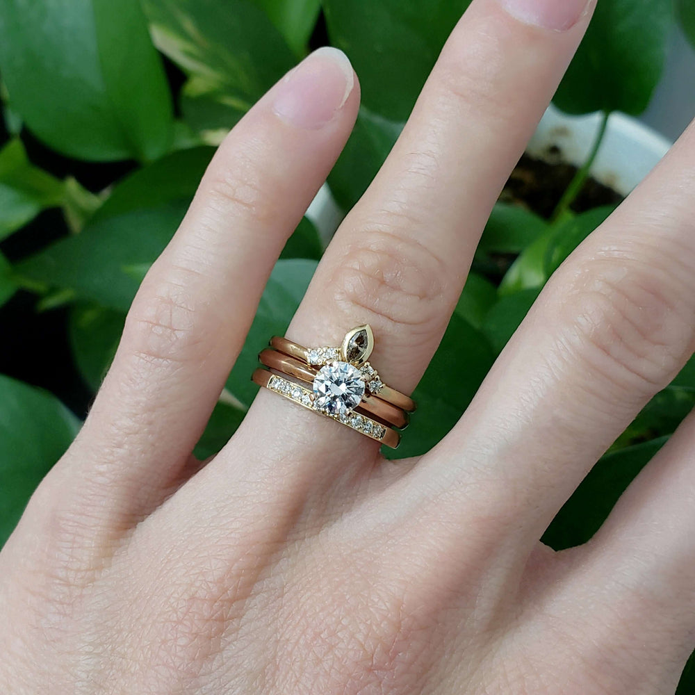 Yellow gold lab diamond wedding ring stacked with round diamond and marquise accent engagement rings
