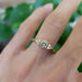 Zira Yellow lab diamond engagement ring in yellow gold shown on hand, close-up