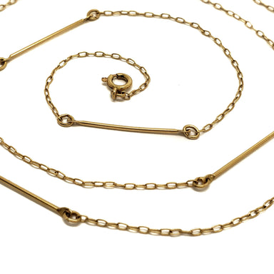 Close-up of the 14kt yellow gold vintage bar chain necklace showing the bar links and clasp